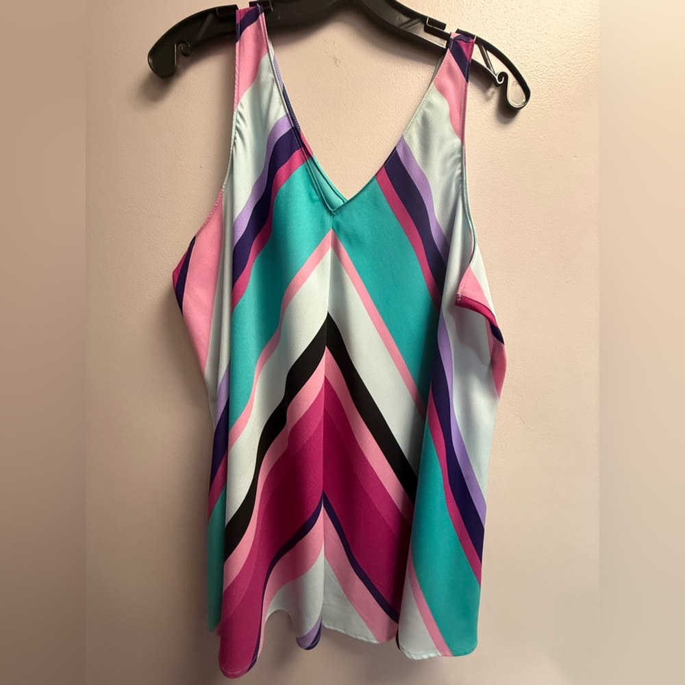 2/$29 on $29 Tops. EUC Lane Bryant V-Neck Chevron Top Pink/Teal/Purple Sz 18